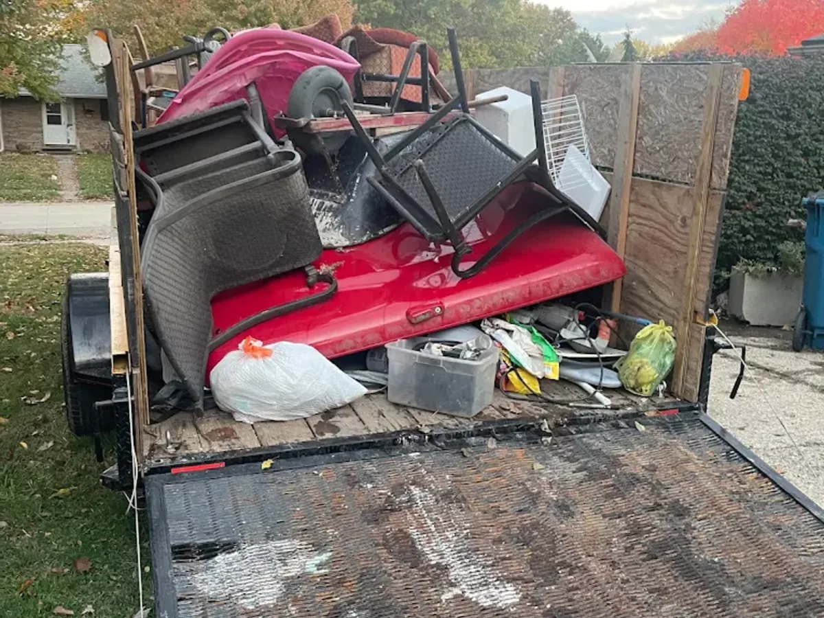 Trailer loaded with furniture and household junk